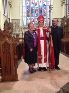 Patty with the Bishop and her rector